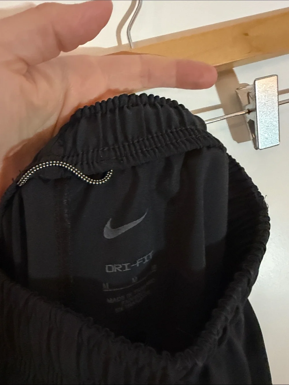 Nike Black Track Pants with White Swoosh Logo